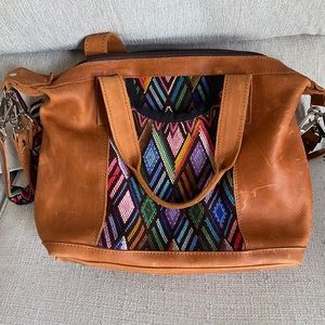 Nena and Co leather bag with unique detailing on front and strap